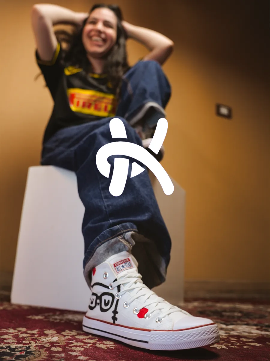 KULT girl wearing hand-painted sneakers